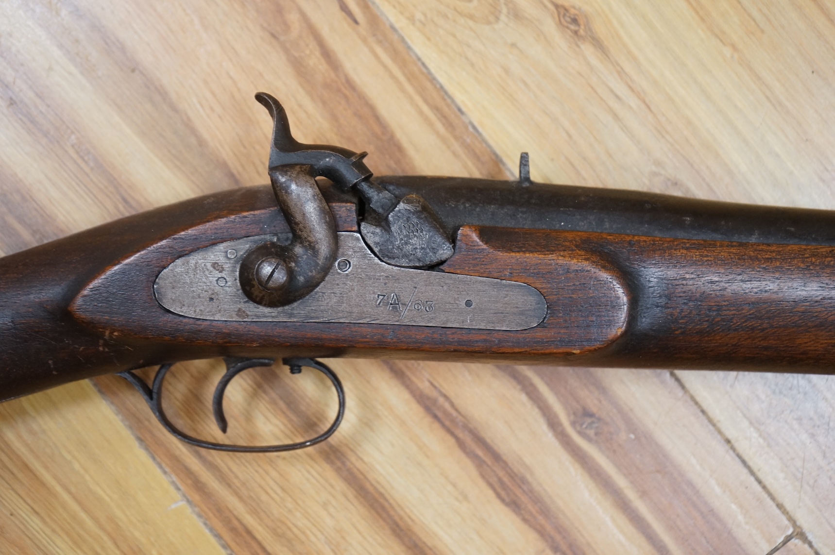 An Indian military style percussion musket, barrel 96cm, the overall length 135cm, with military style mounts and lock, although the barrel has some age the stock and furniture is later